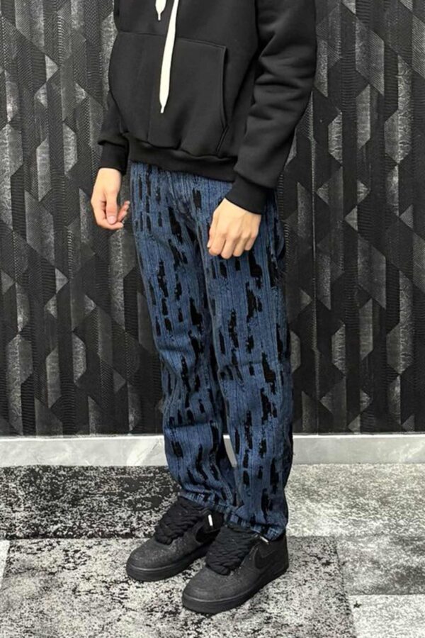 Jeans regular con fantasia